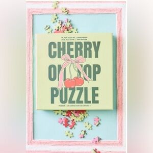 Anthropologie ICON 500-PIECE PUZZLE
Style No.  101612133
Color:  Cherry